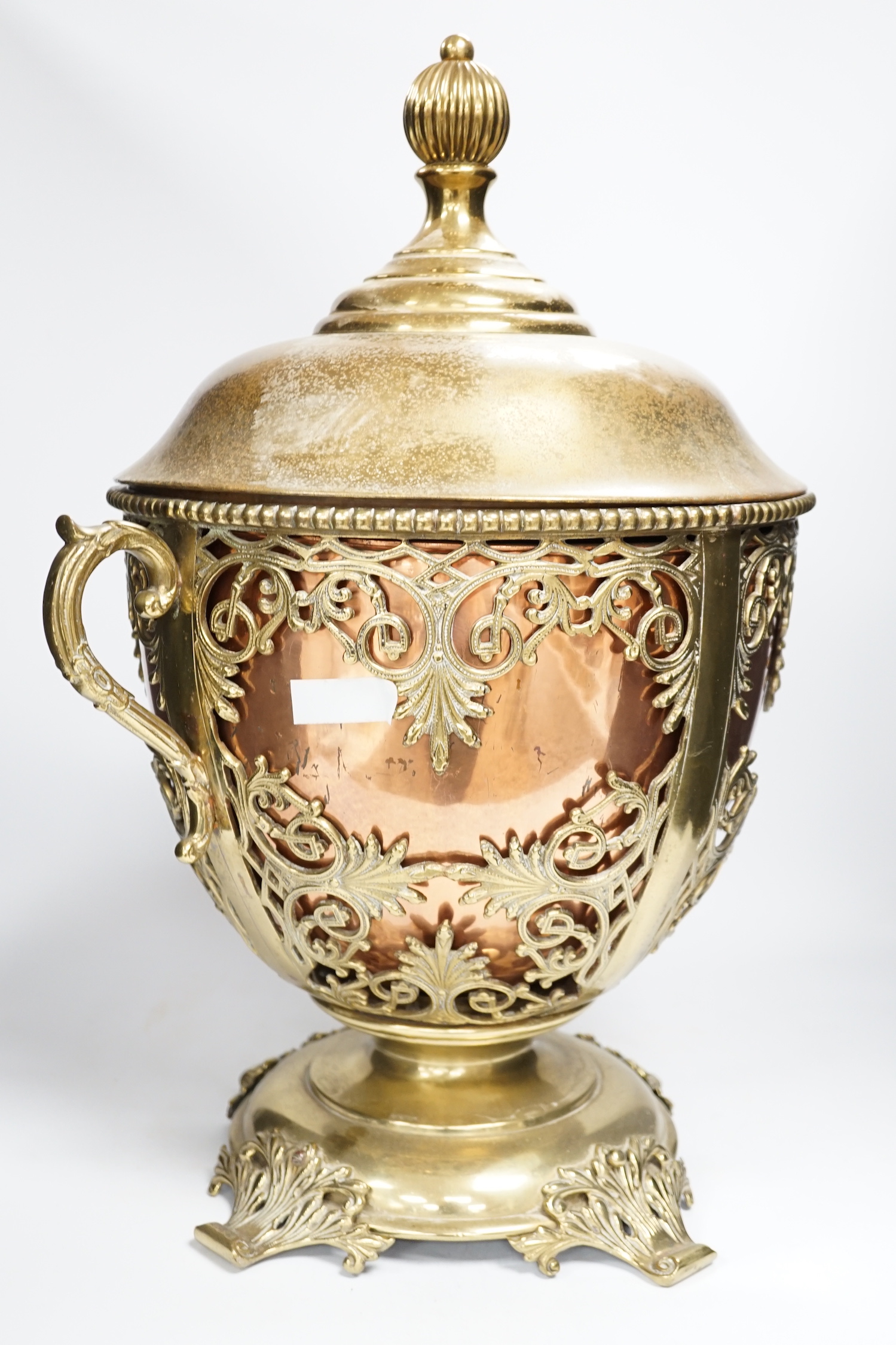 A Victorian copper and brass lidded tureen and assorted metalware, largest 57cm high